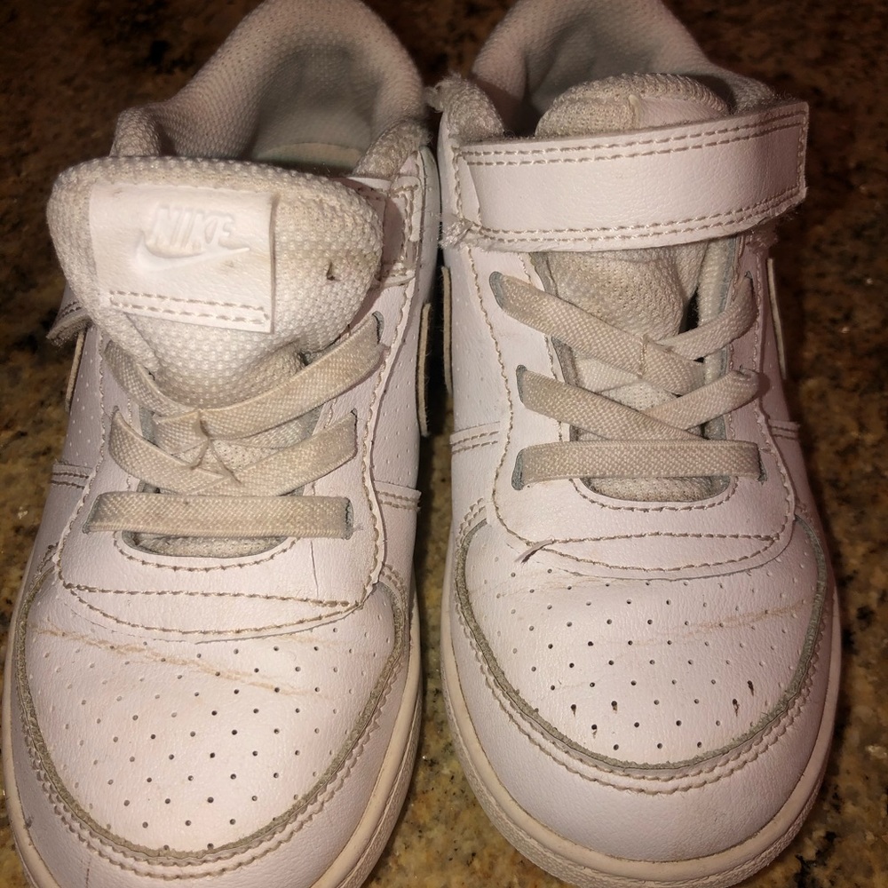 Nike’s. Worn a handful of times for cheering.